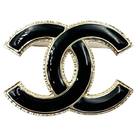 black chanel pin|authentic Chanel brooches.